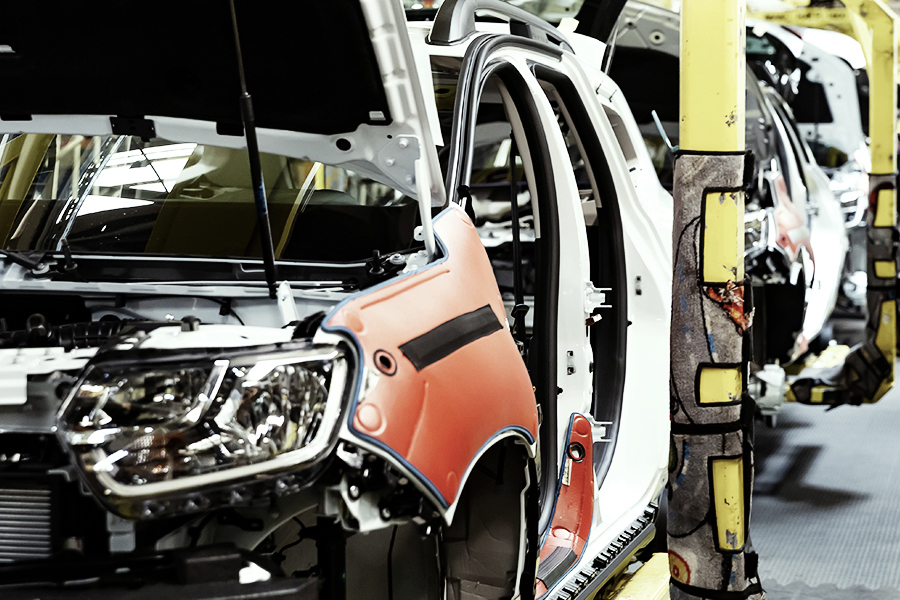 A car being put together on an assembly line