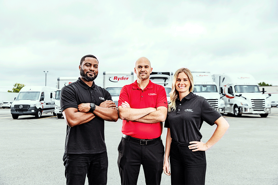 Ryder employees in front of trucks for lease