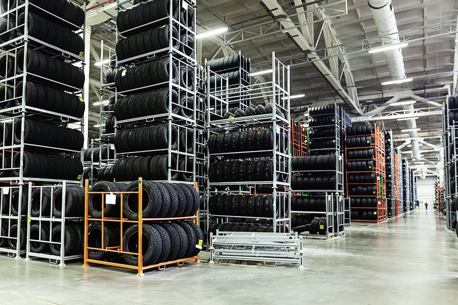 Hundreds of tires being stored in a warehouse