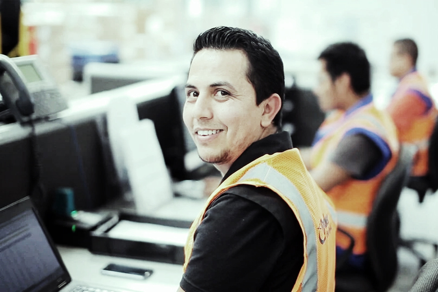 employee at a desk with laptop